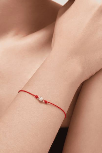 Round brilliant 14k bezel cord bracelet